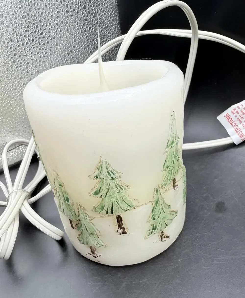 The EverMore Candle Scented Electric Lighted Candle Believe Christmas Decor